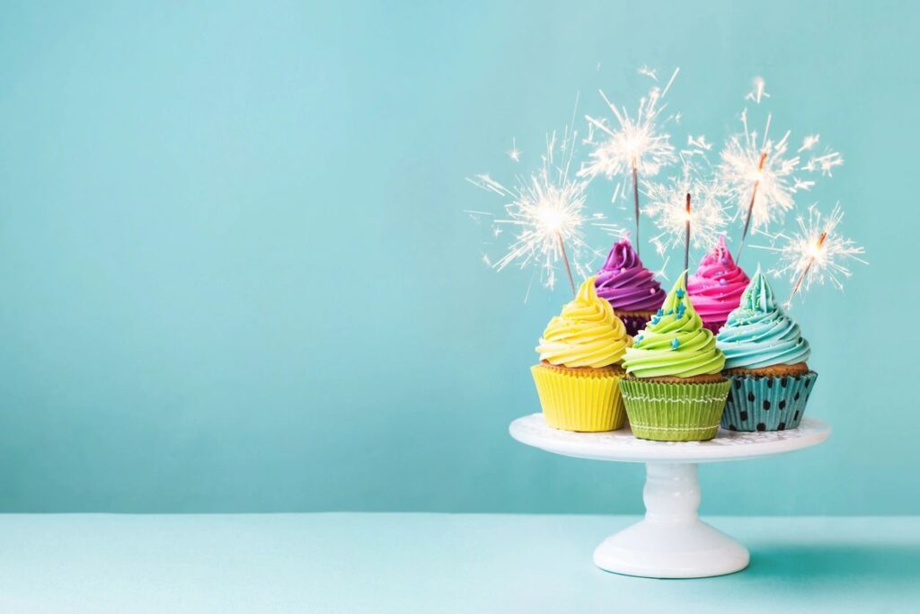 Happy birthday to Josie! Cupcakes on a tray with sparkler candles